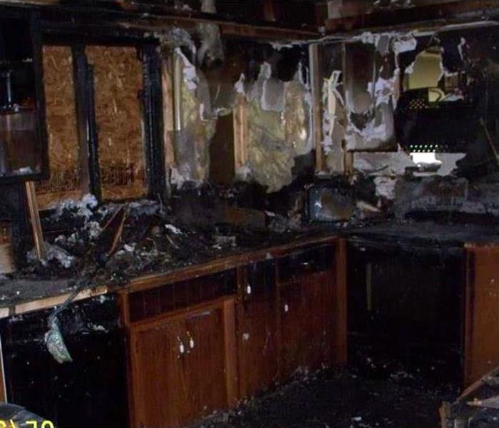 fire damaged kitchen with soot damage